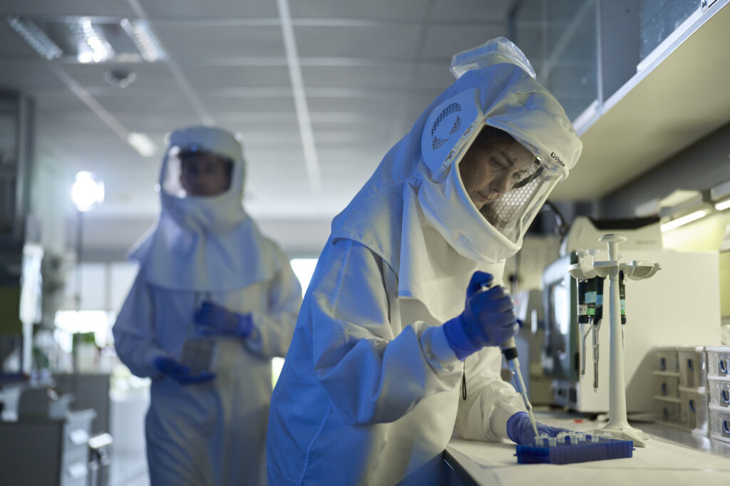 Two people wearing the Clyype full-face respiratory protection mask.